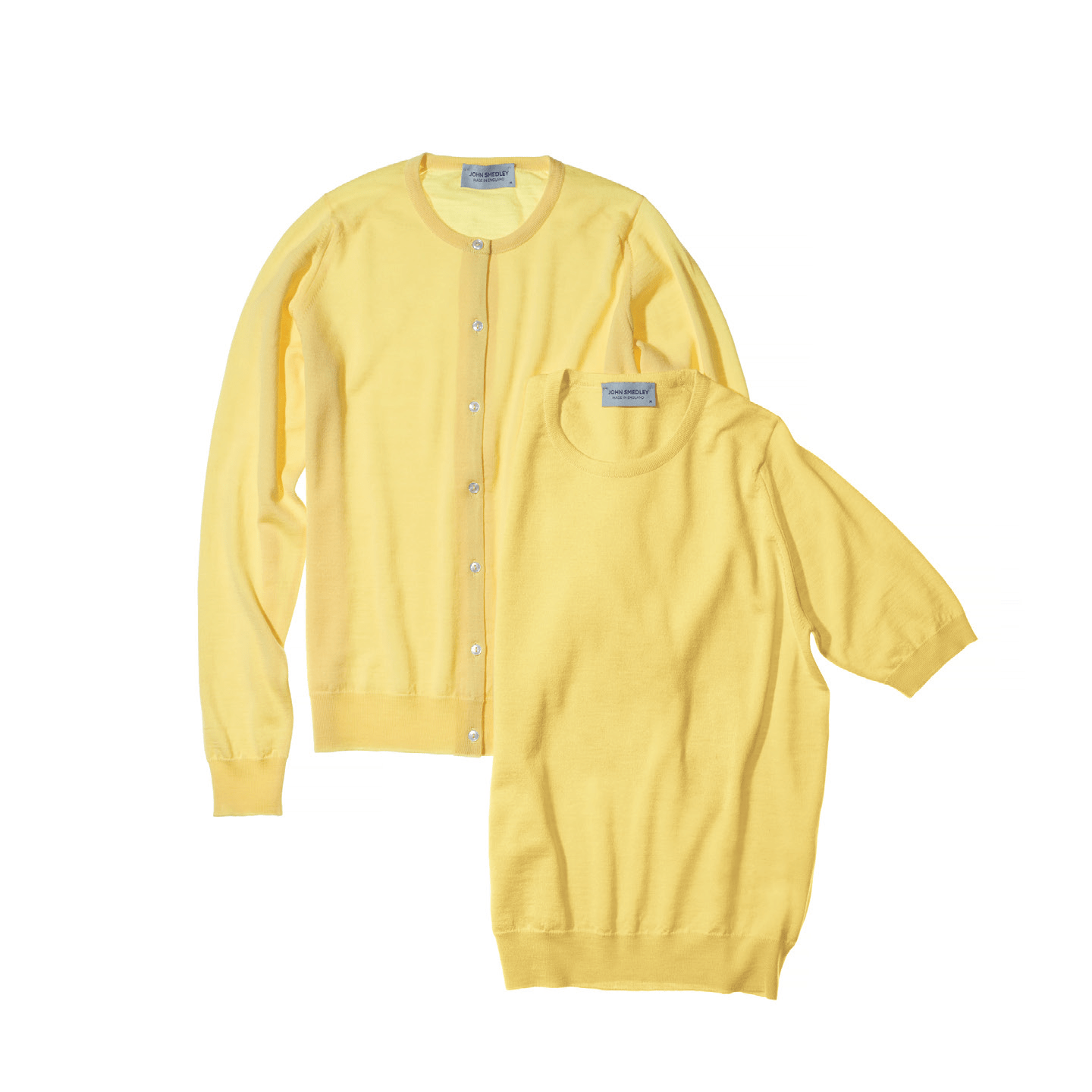 ニット¥26,000・カーディガン¥33,000(リーミルズ エージェンシー〈ジョン スメドレー〉)
