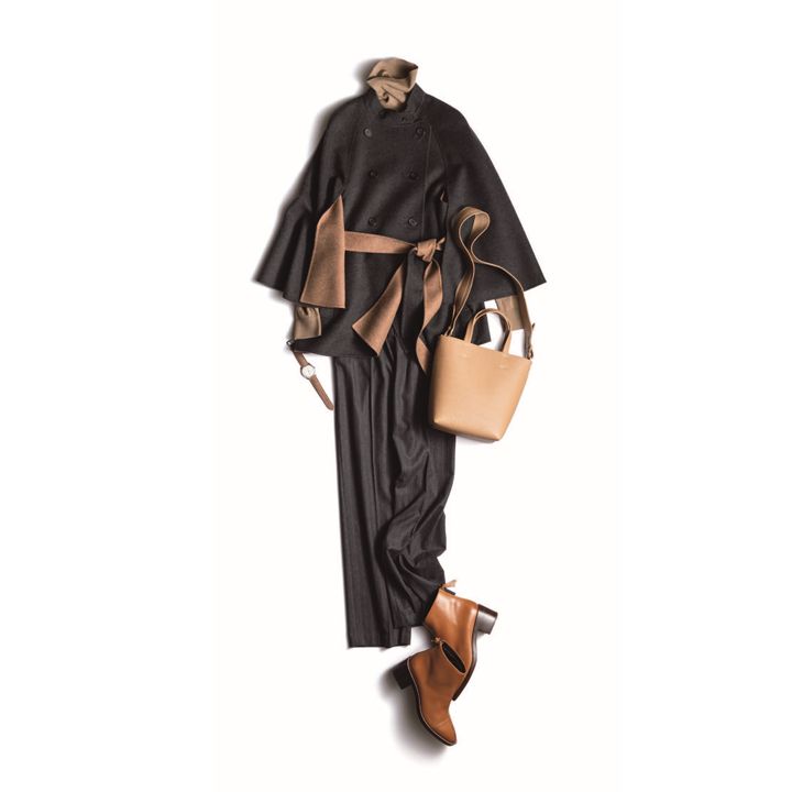 カシミヤコート・ニット(Theory luxe)、パンツ(東レ・ディプロモード〈セブンティ〉)、時計(ソーウインド ジャパン〈ユリス・ナルダン〉)、バッグ(ebure〈ebure〉)、ブーツ(コール ハーン ジャパン) 撮影/佐藤 彩 BY:『Precious2月号』小学館、2020年
