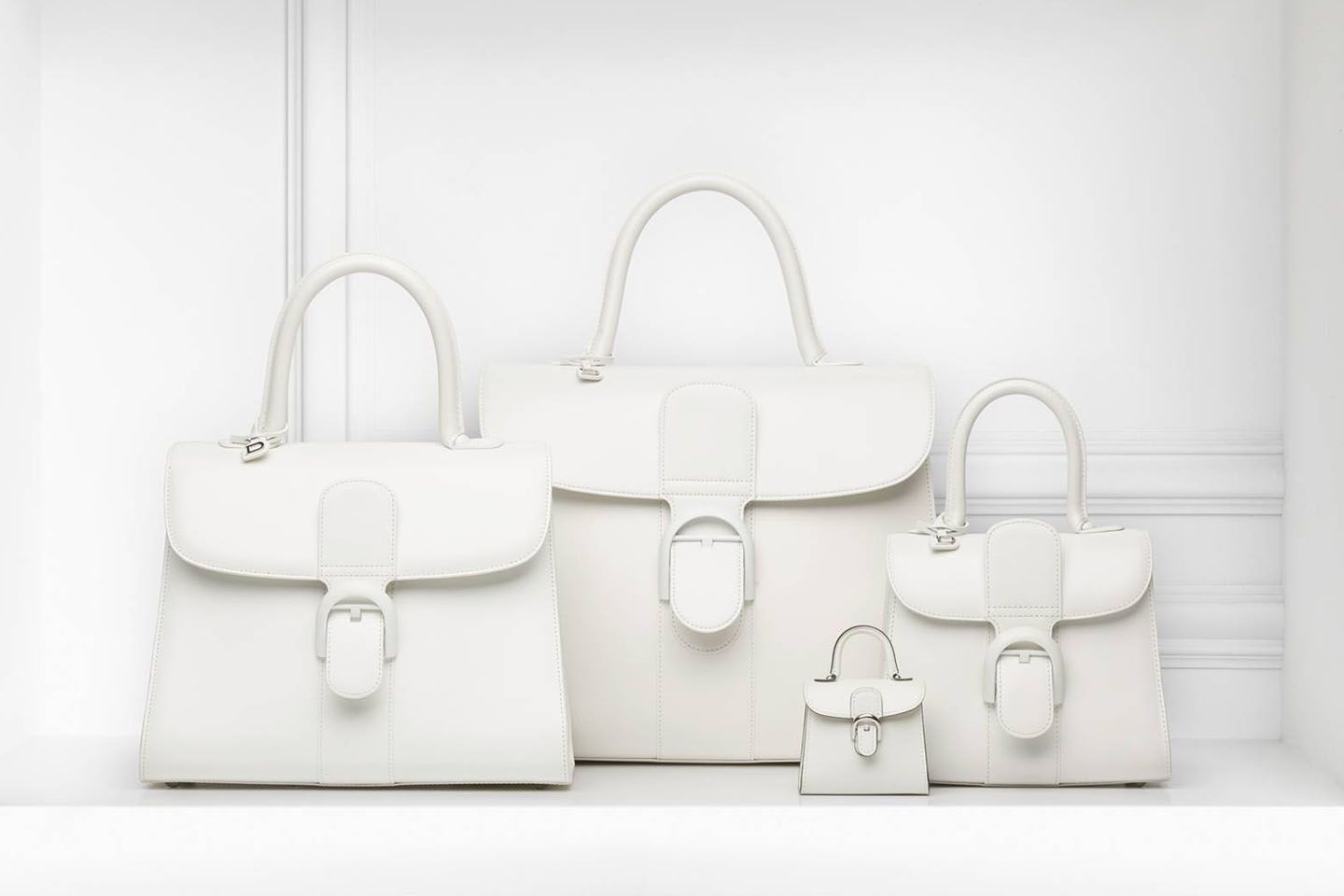 左から「ブリヨン MM」【縦21.5×横29×マチ13.5cm】¥642,000・「ブリヨン GM」【縦27.5×横36×マチ19cm】¥854,000・「ブリヨン チャーム」【縦7.5×横8.5×マチ4.5cm】¥72,000・「ブリヨン ミニ」【縦35×横20×マチ11cm】¥529,000(税抜)※この4点を含めて、現在「ブリヨン」は全8サイズ展開。