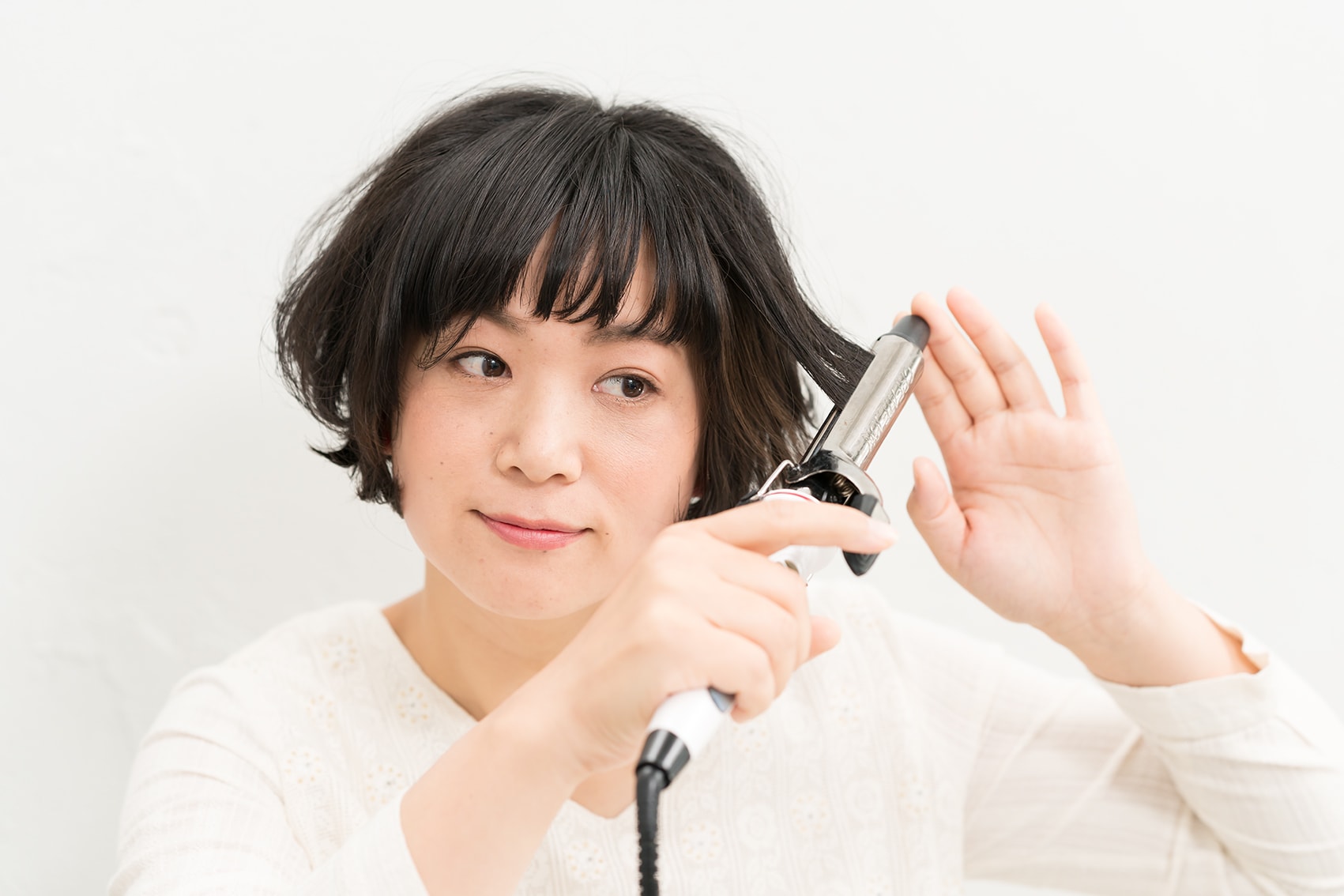 毛束をとって巻く