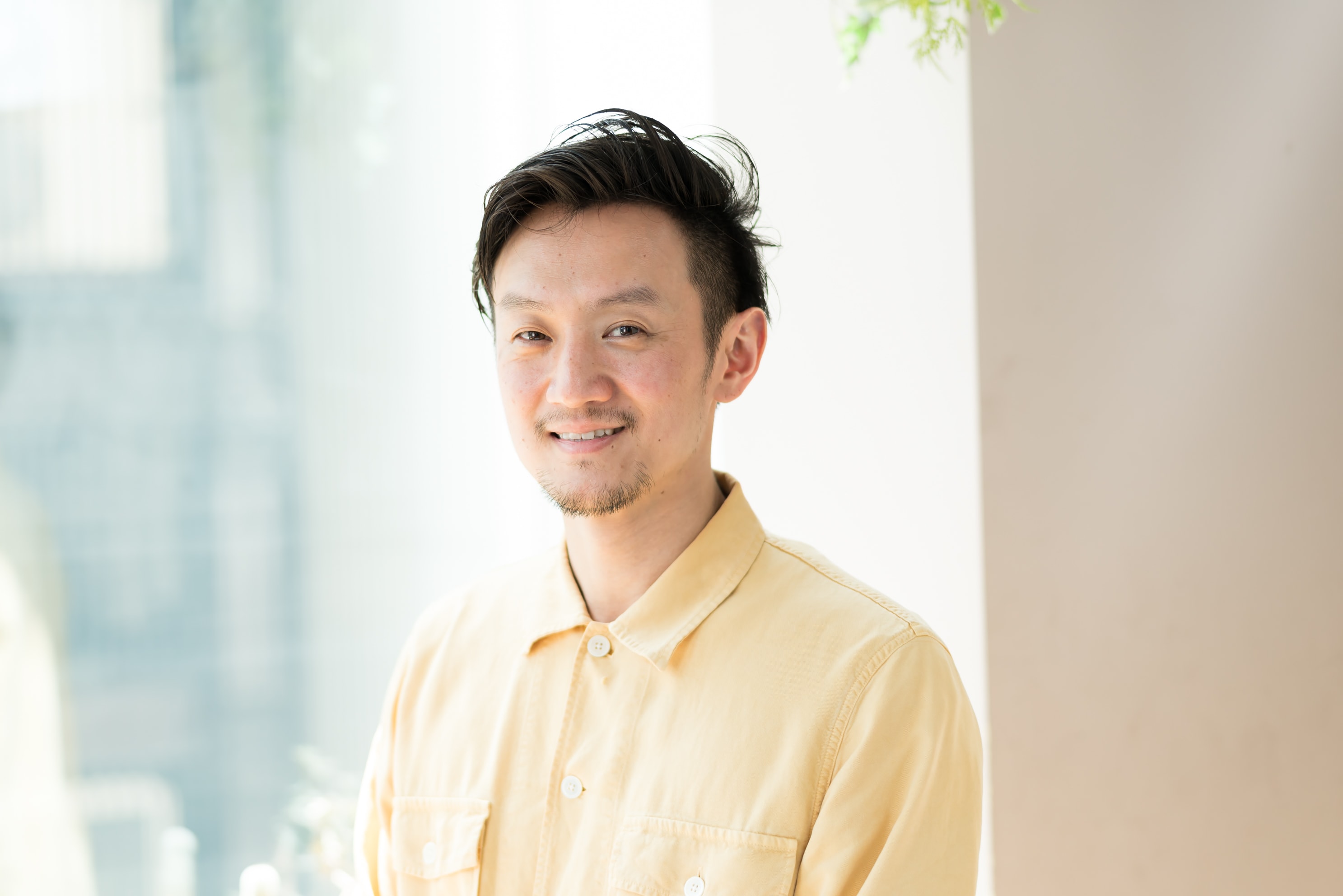 RamieGINZAマネージャー・加藤貴大さん。ゴルフが趣味で体力づくりのためにジムに通っているのだそう。「目標はシックスパックです!」