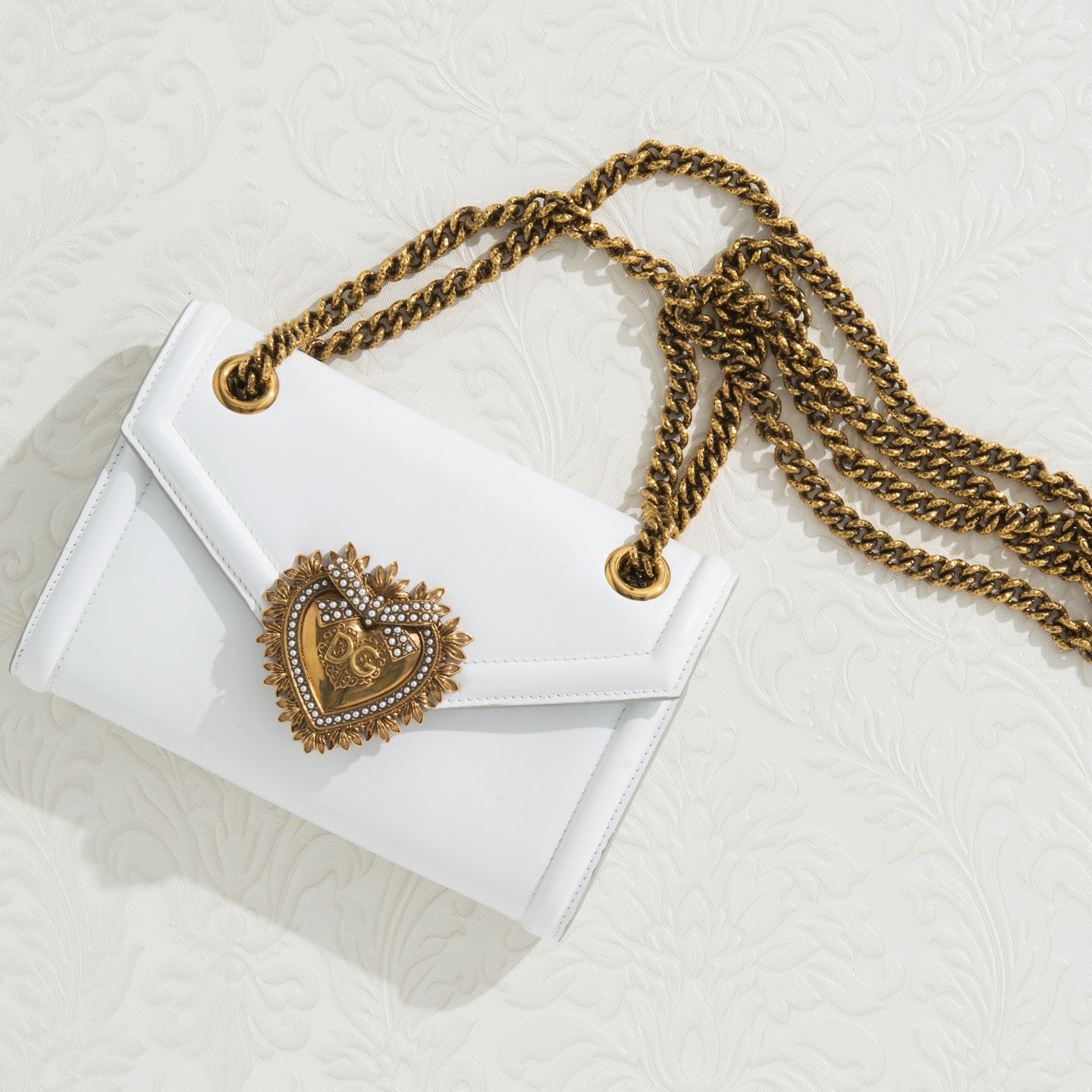 ウォレットチェーンバッグ「DEVOTION BAG(ディヴォーション バッグ)」【縦11.5×横17.5×マチ3cm】¥125,000(税抜)