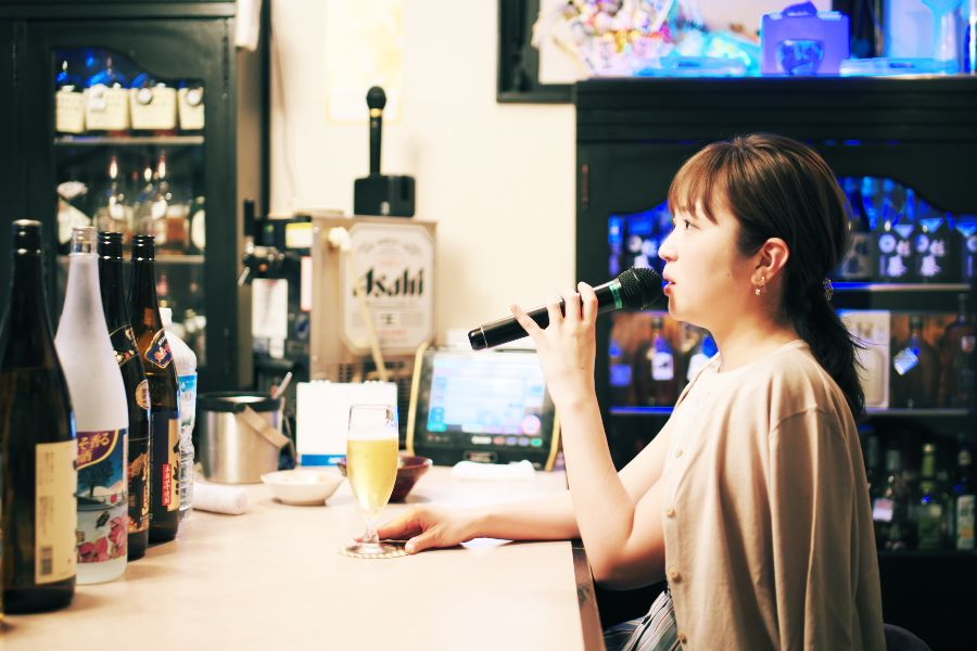 高得点を目指し、得意曲を歌い続ける