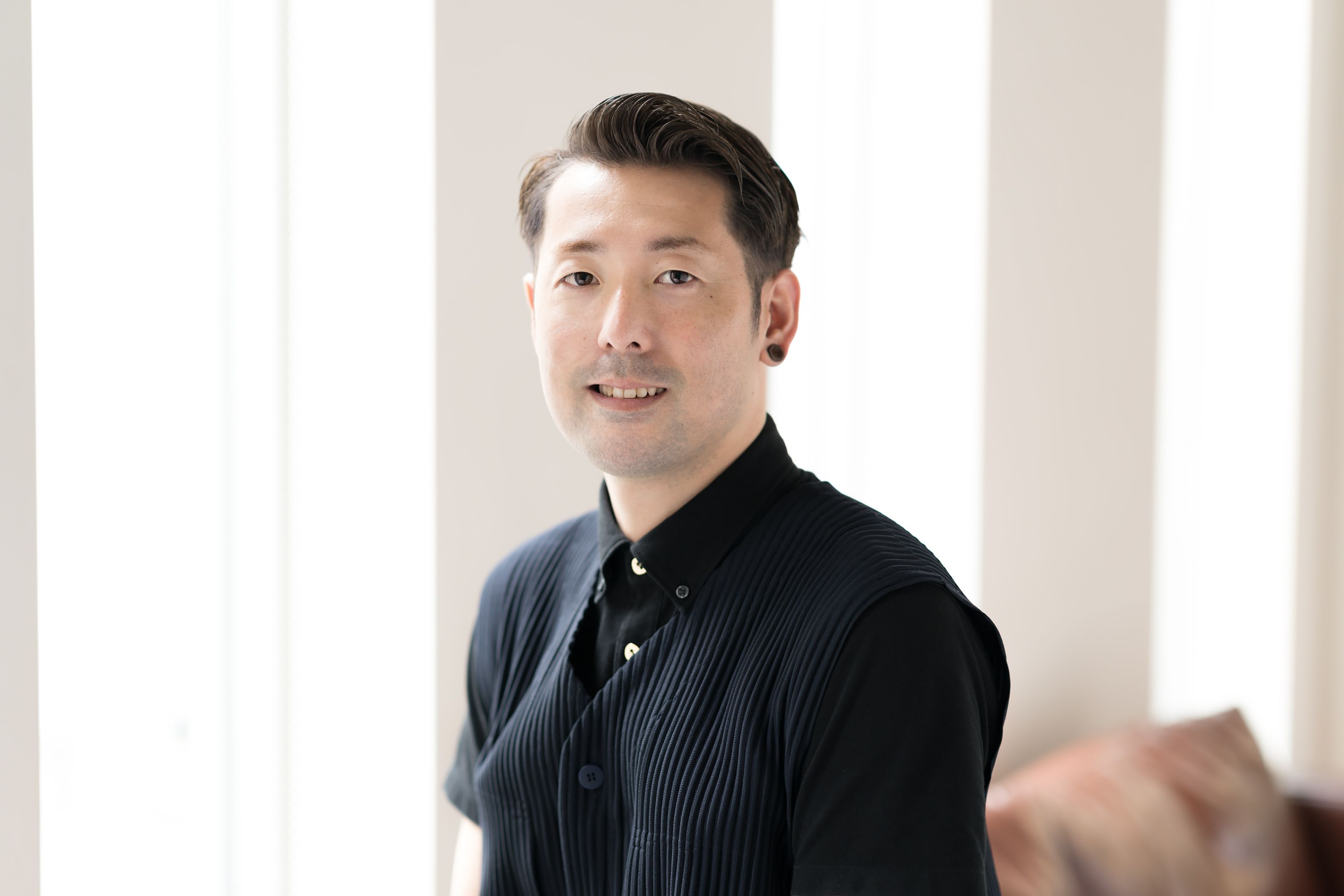 ディレクター 宮﨑陽平さん。「小学生から高校まで、ずっと野球一筋。大学推薦の誘いを受けるほど、ピッチャーとして鳴らしていました」