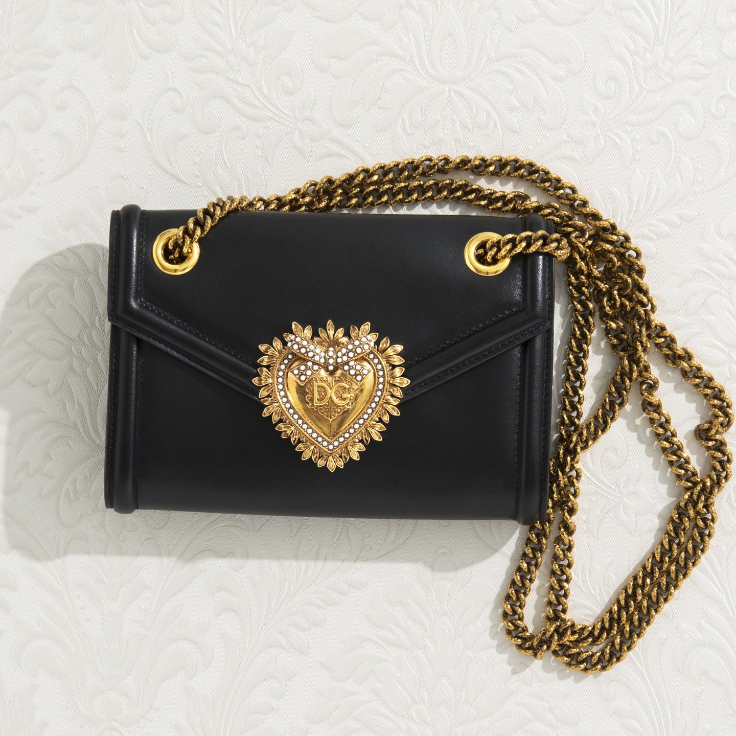 ウォレットチェーンバッグ「DEVOTION BAG(ディヴォーション バッグ)」【縦11.5×横17.5×マチ3cm】¥125,000(税抜)