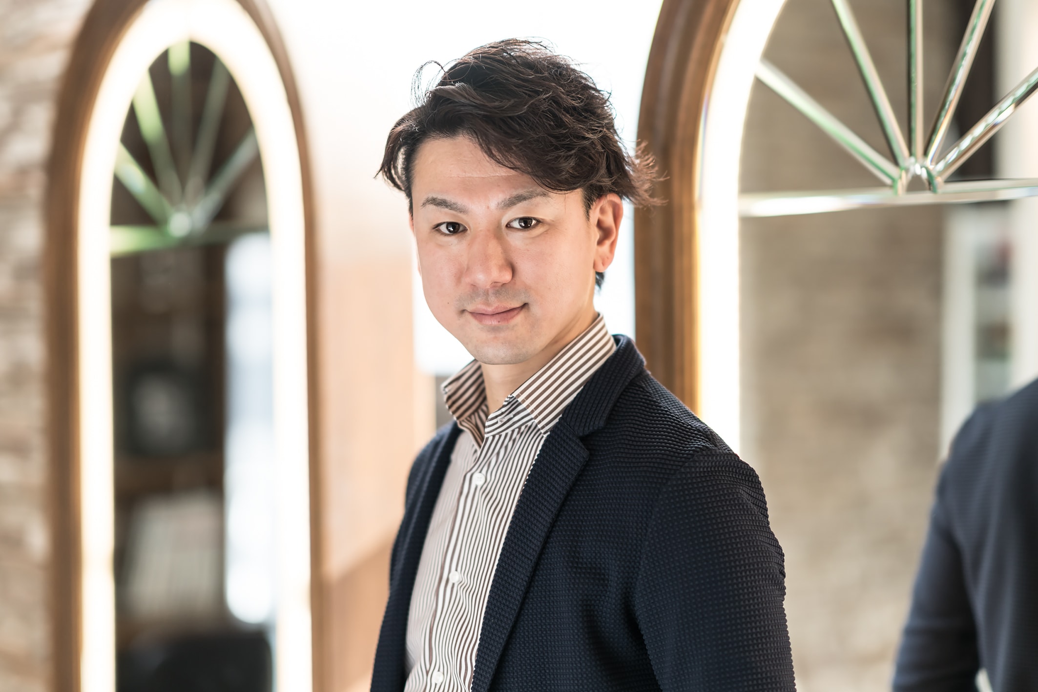 MINX エグゼクティブディレクター・菅野久幸さん。「1年ほど前から中国語を勉強しています。聞き取りが難しいですね」